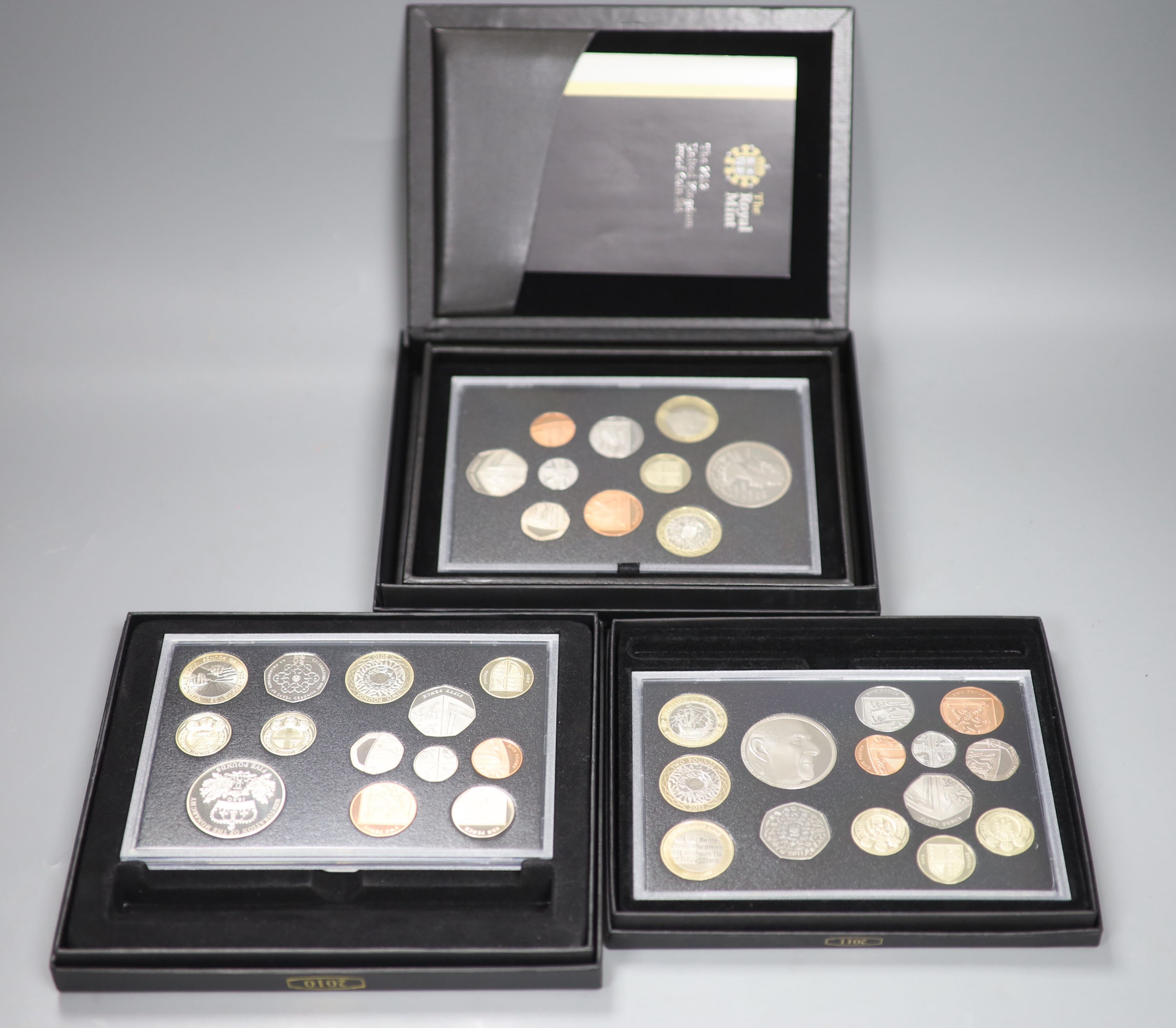 Three Royal Mint UK proof coin years sets; 2010, 2011 and 2012 together with other Royal Mint coins of EF grade or better (some possibl